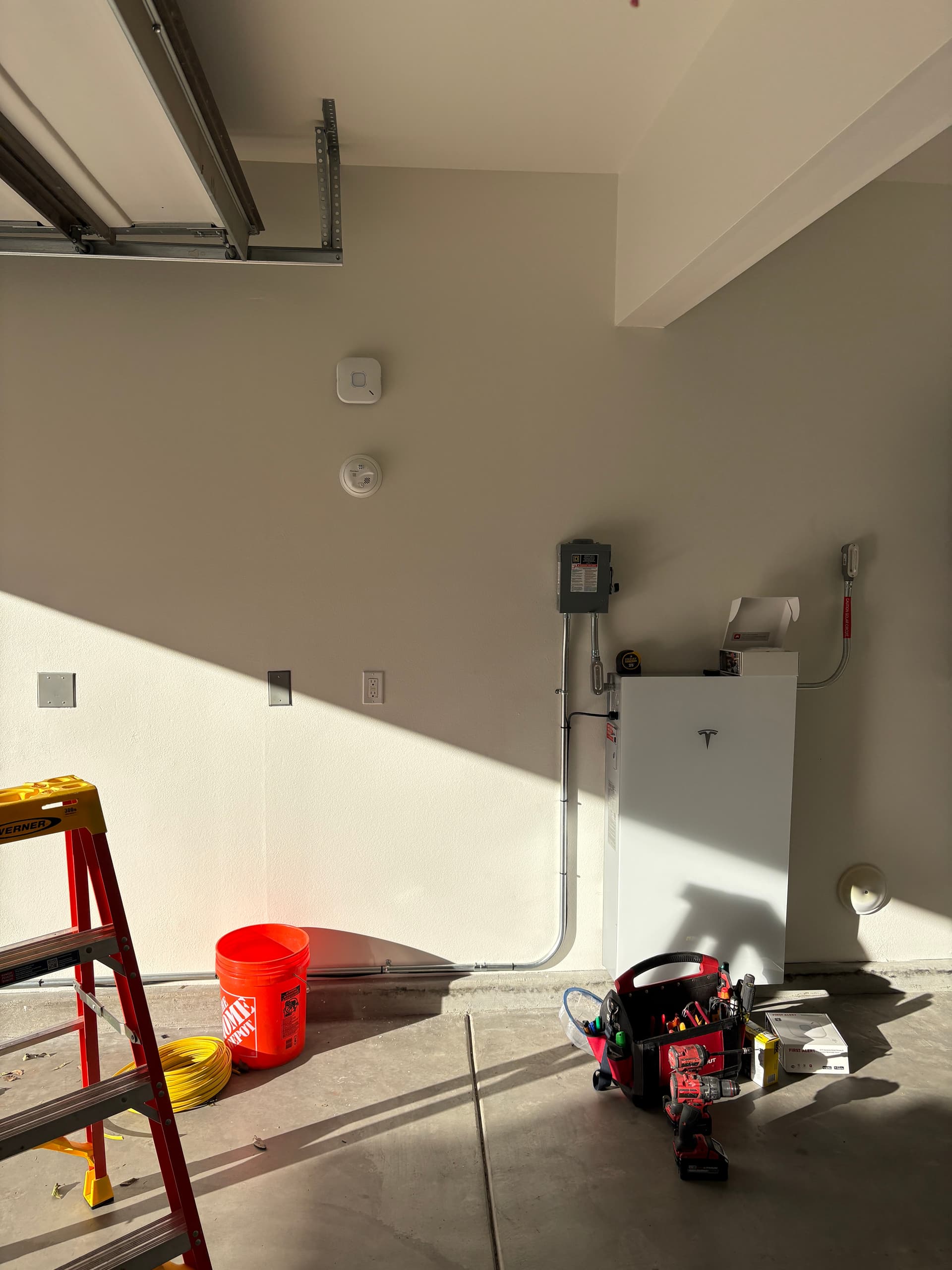 Tesla Powerwall 3 install in progress, showing wiring and disconnect at a North County San Diego home