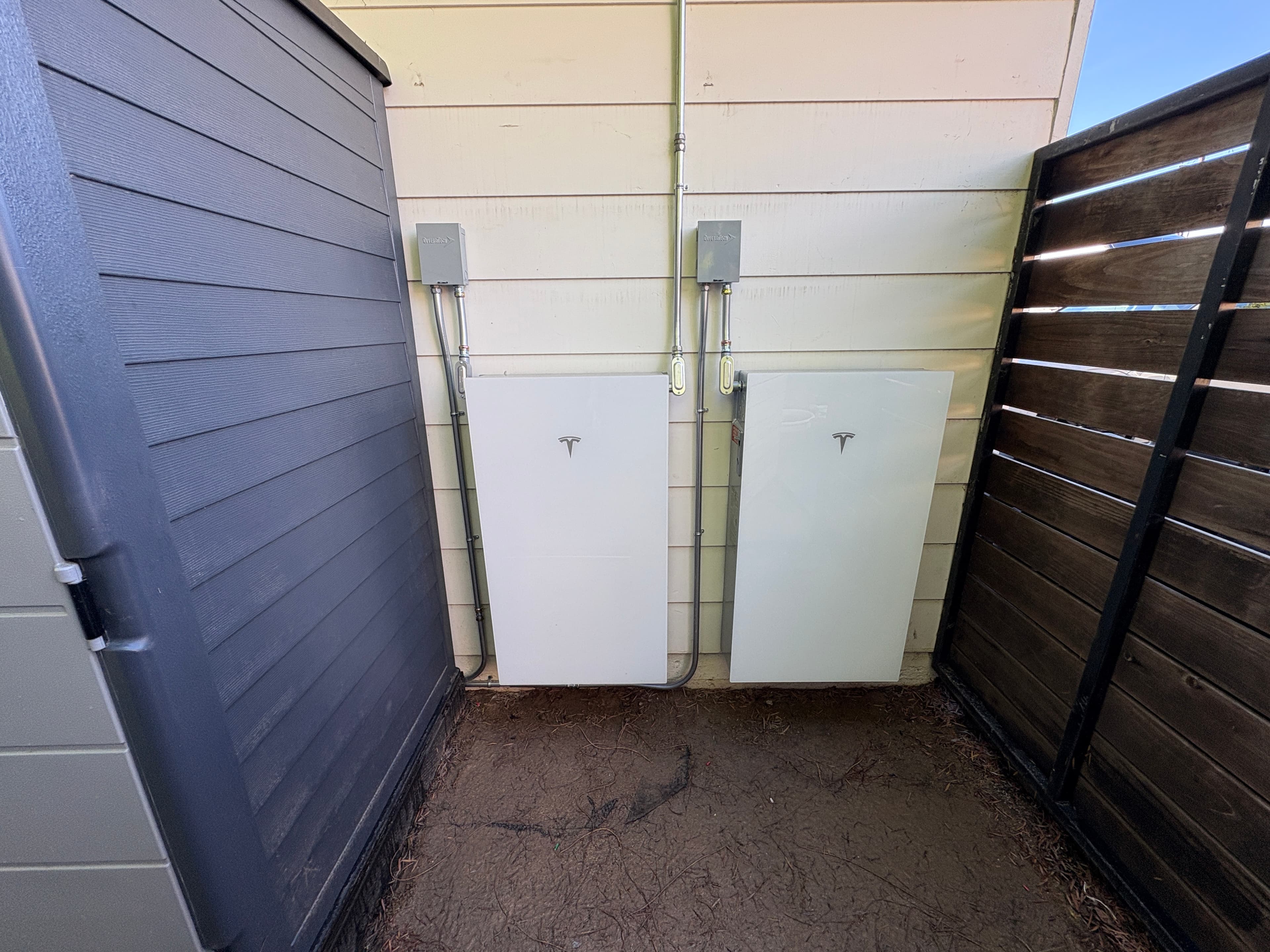 Two Tesla Powerwall units, expandable battery storage