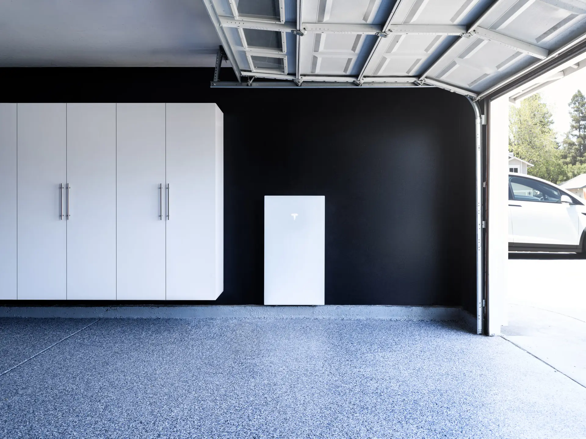 Tesla Powerwall 3 on garage wall