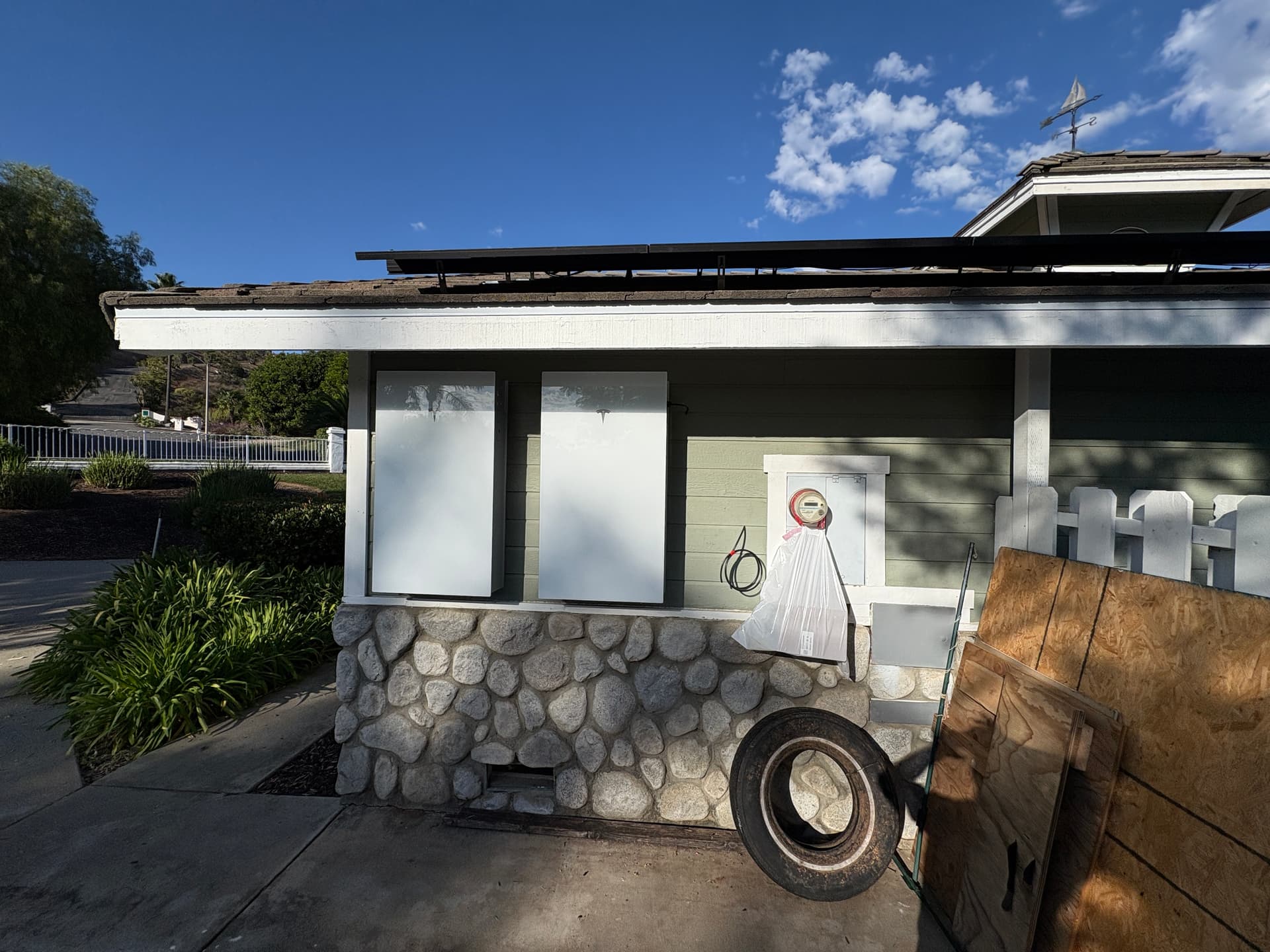 Tesla Powerwall 3 wired alongside an existing solar inverter at a North County San Diego home