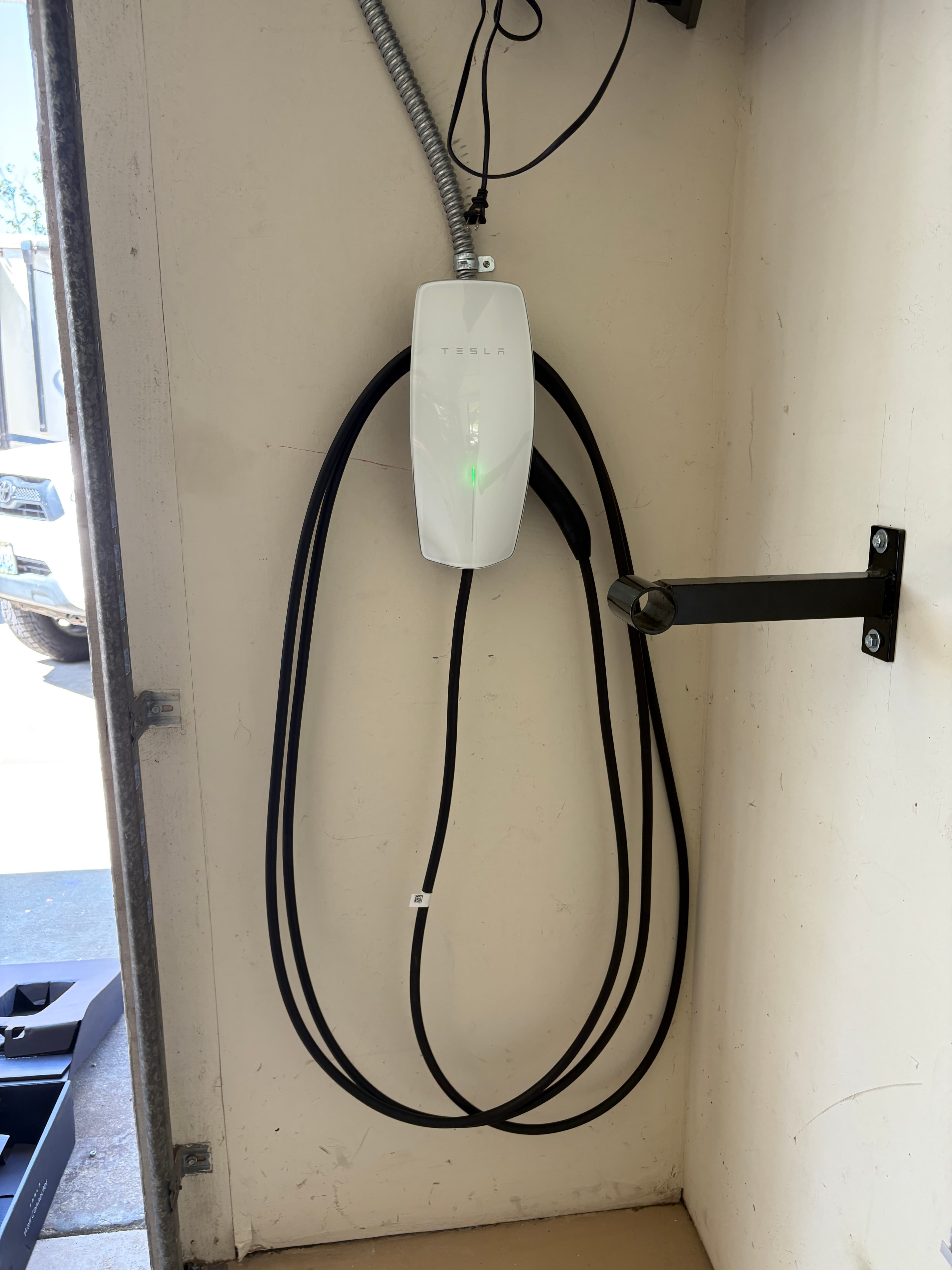 Wall-mounted EV charger installation