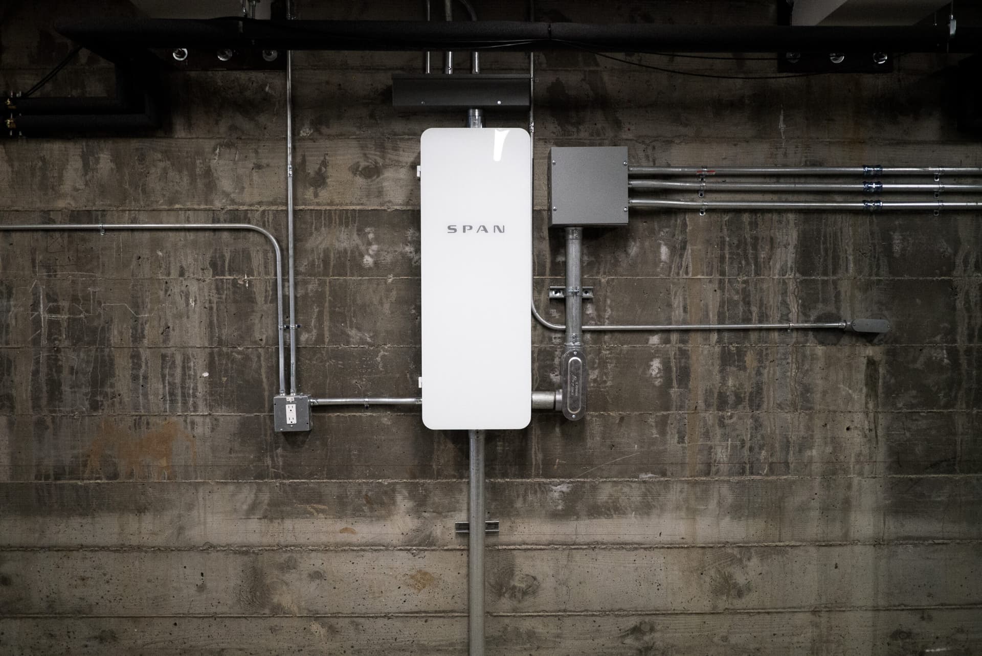 SPAN Drive Level 2 EV charger installed in a San Diego garage