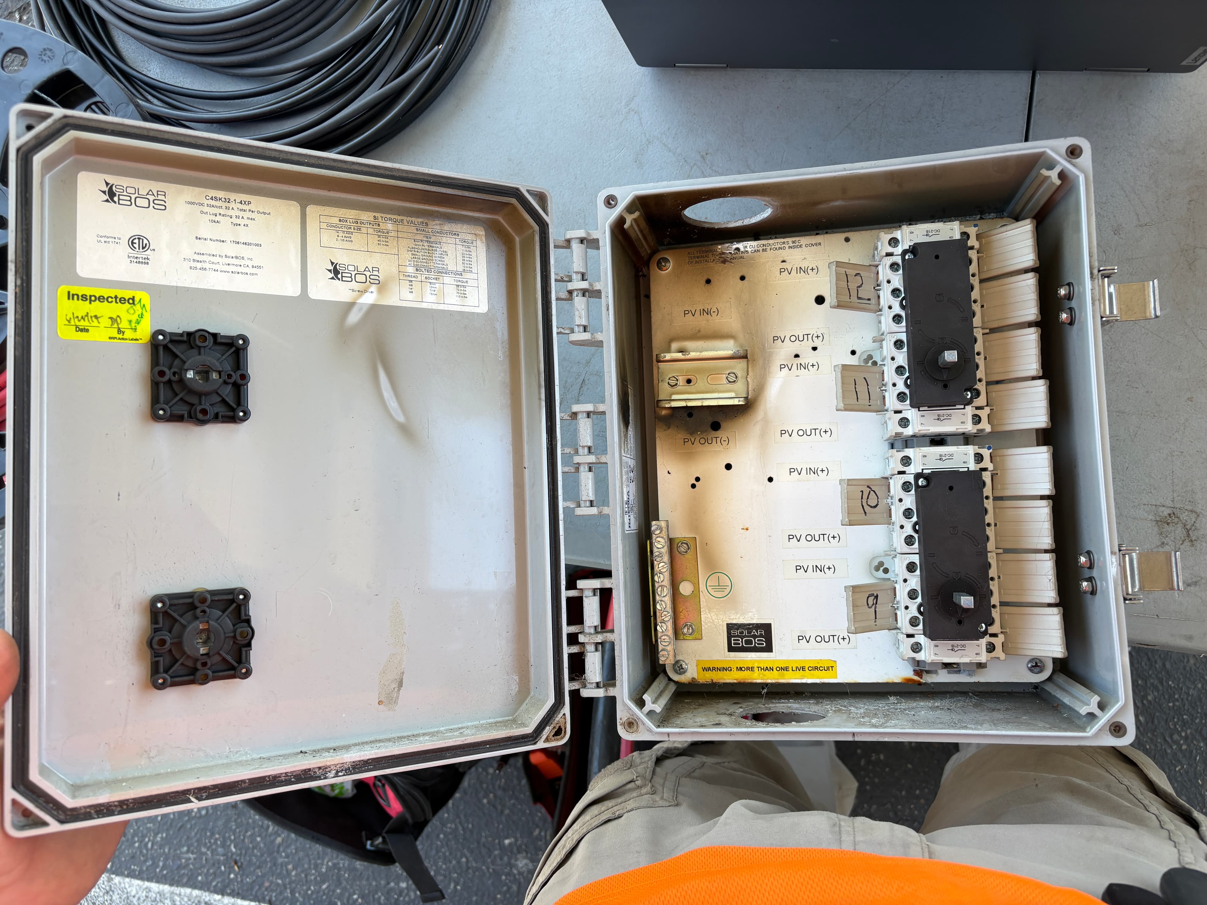 Fully burnt DC combiner showing extent of damage missed by previous contractor