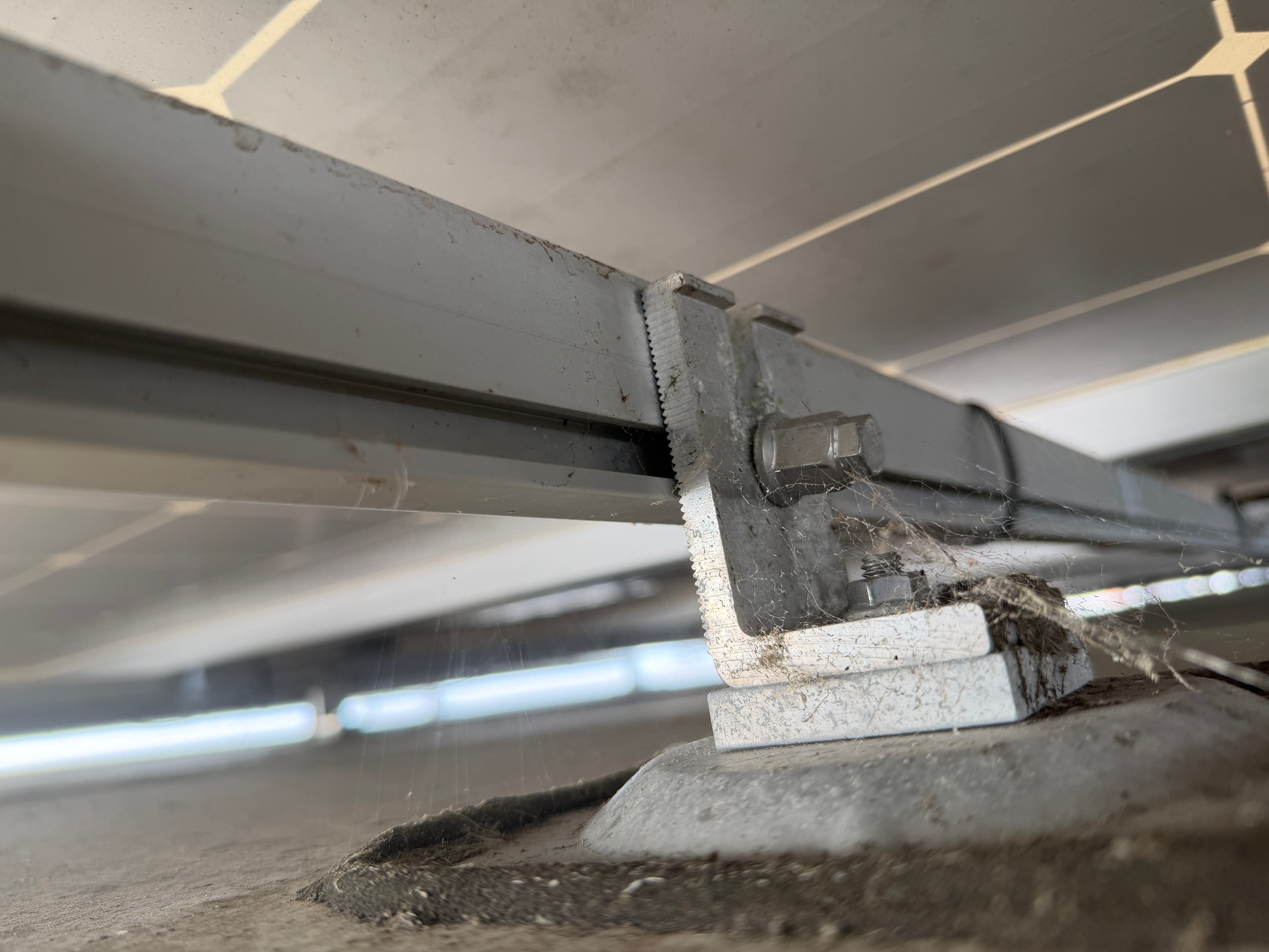 Failed mid-clamp foot on IronRidge racking identified during structural assessment